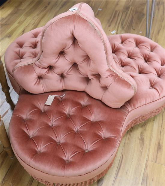 A Victorian pink dralon upholstered three seat conversation settee